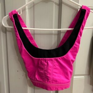 Pink Lululemon crossed back sports bra. Size 4.